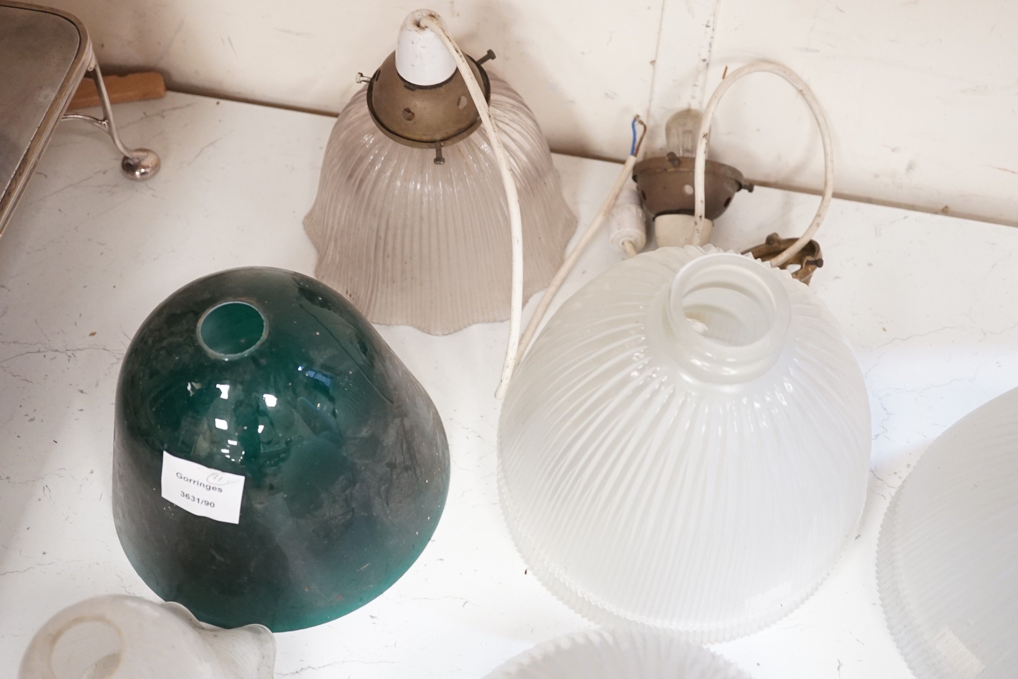 A collection of 11 late 19th/early 20th century glass light shades